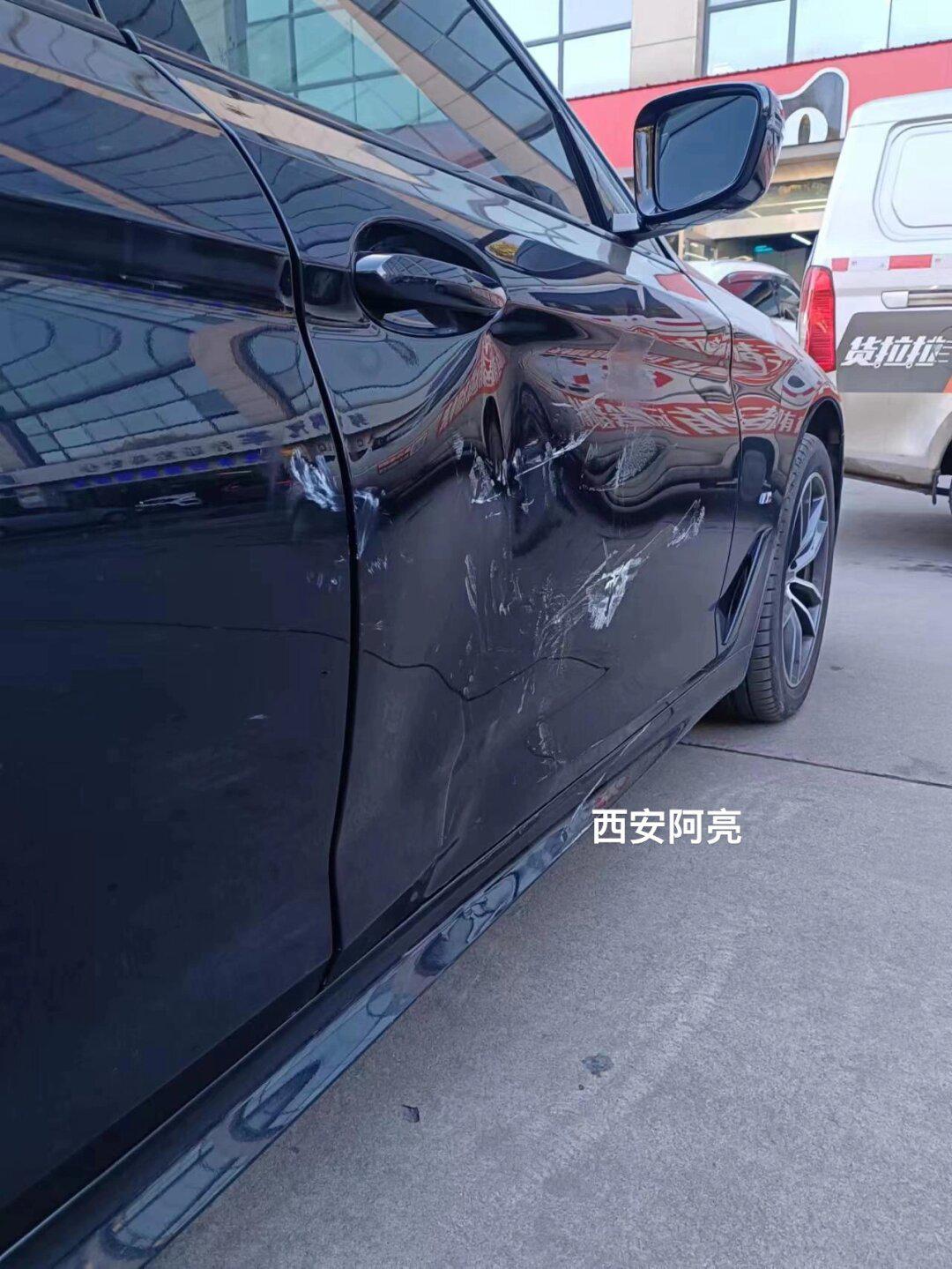 《宝马530》铝合金车门凹陷修复案例