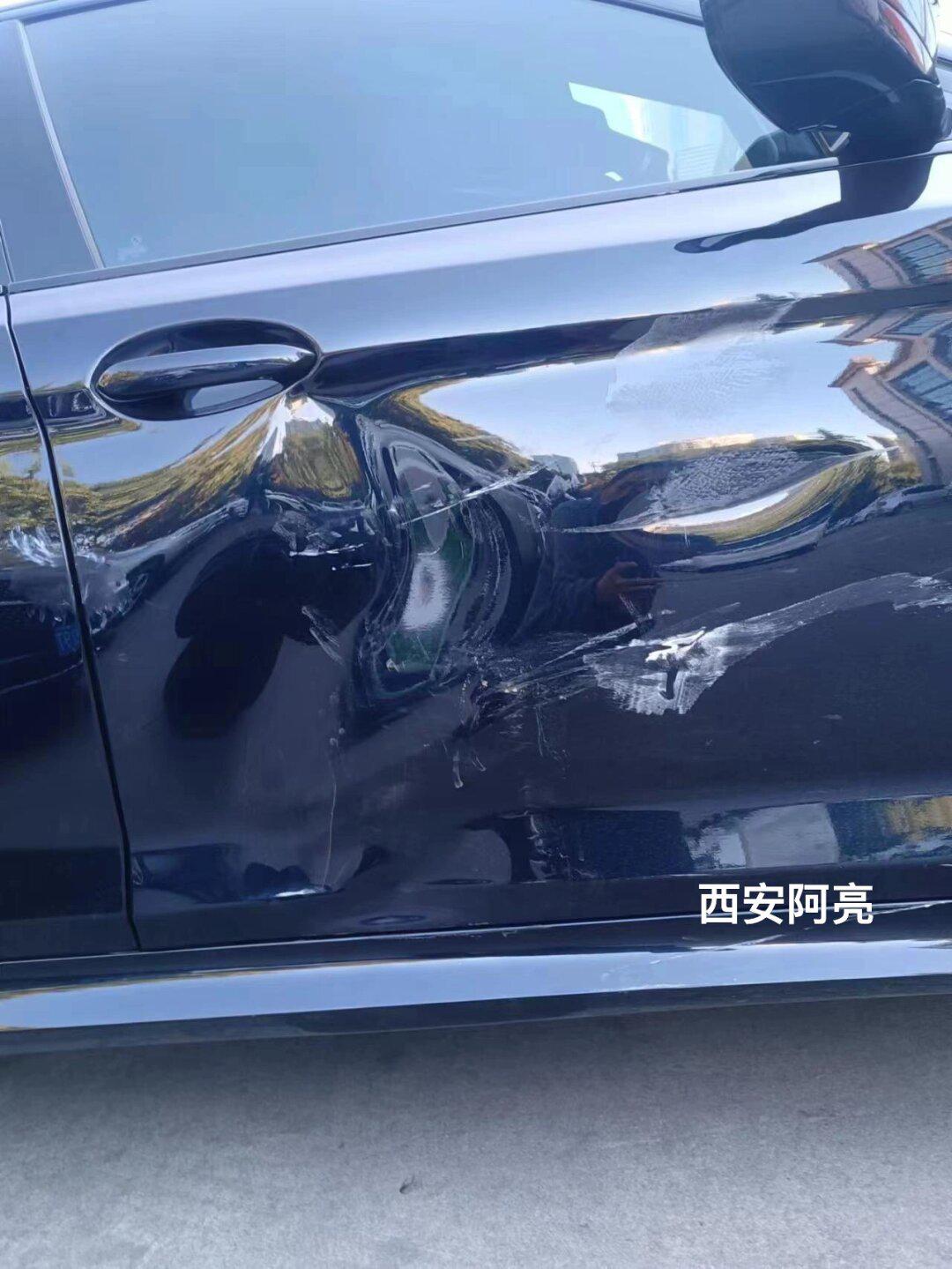 《宝马530》铝合金车门凹陷修复案例