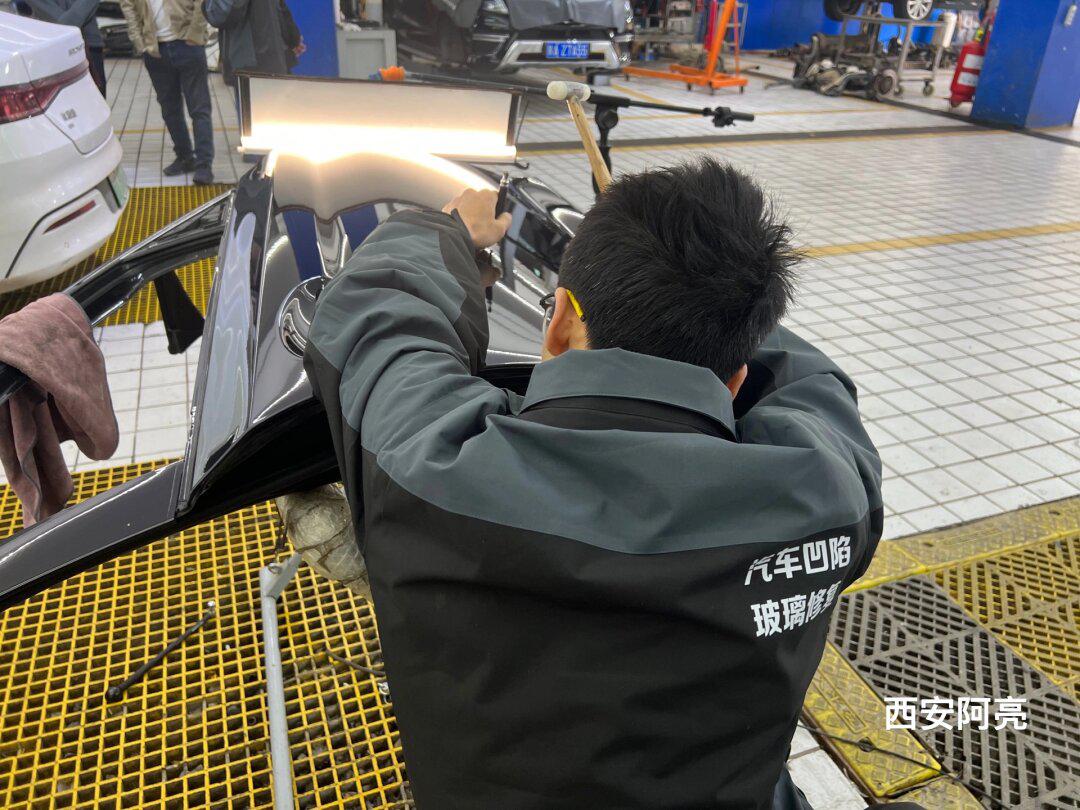 《宝马530》铝合金车门凹陷修复案例