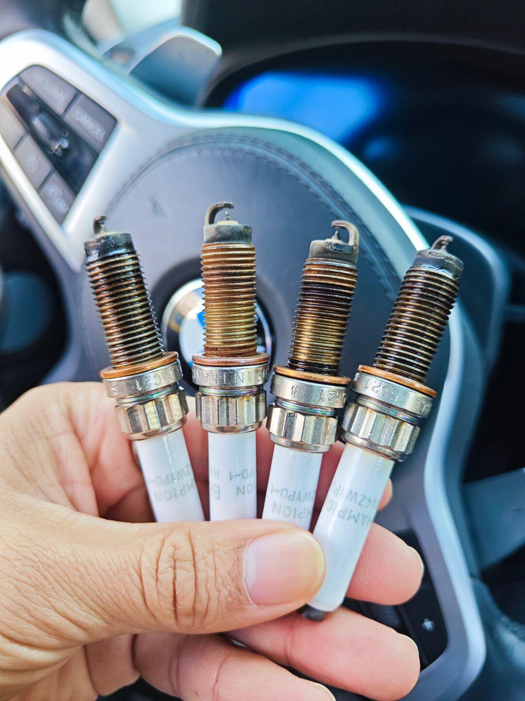 近三万公里,宝马x3首换火花塞