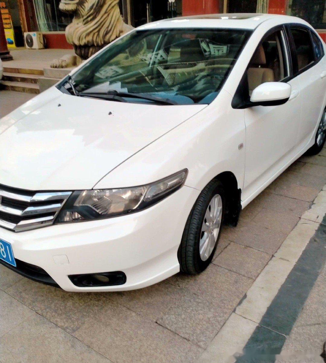 2014年3月,拿到驾照的第二个月就买下了这人生中的第一台小车广本锋范