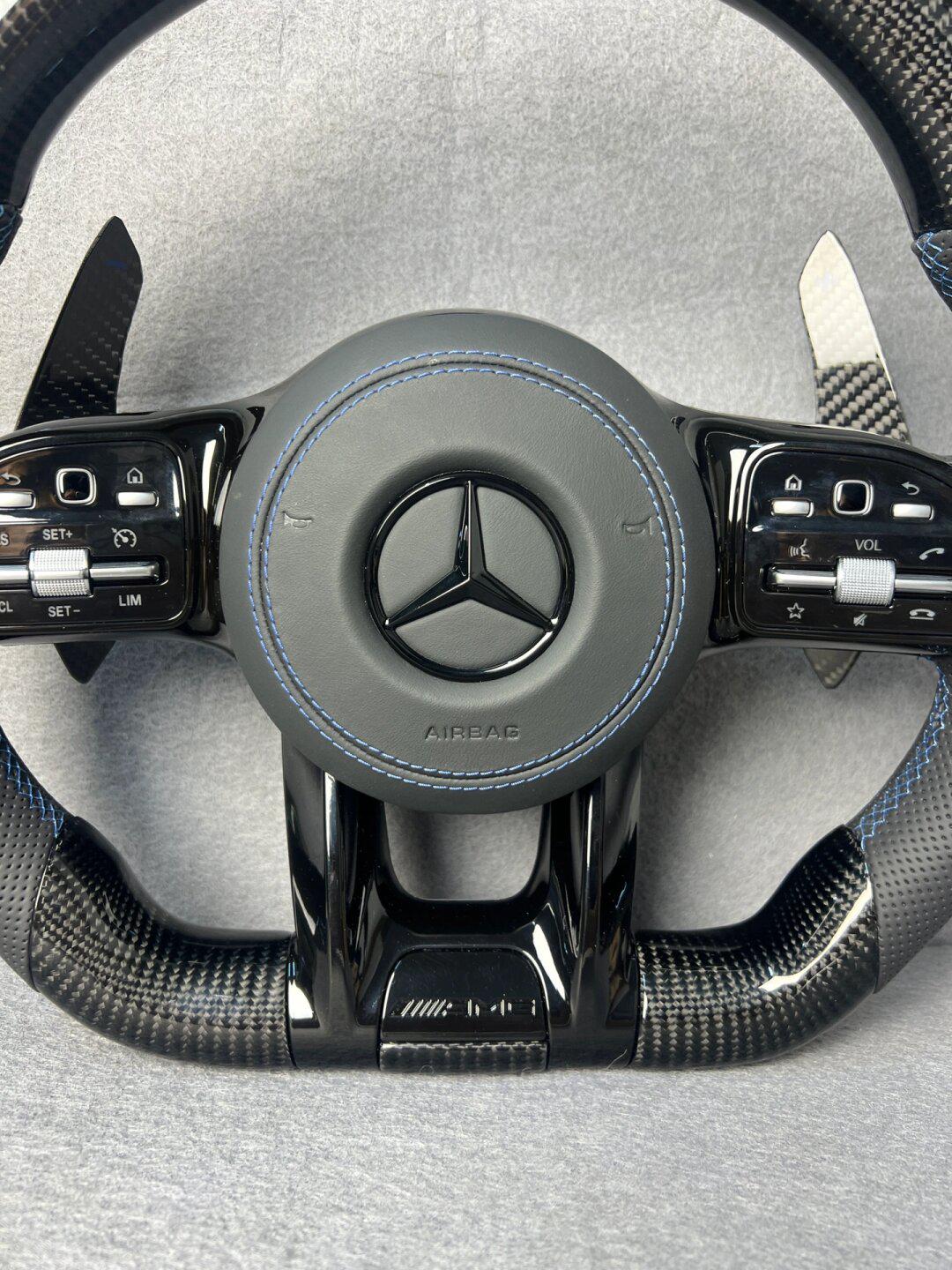 奔驰amg碳纤维方向盘总成,平底运动款打孔皮方向盘,多功能按键,碳纤维