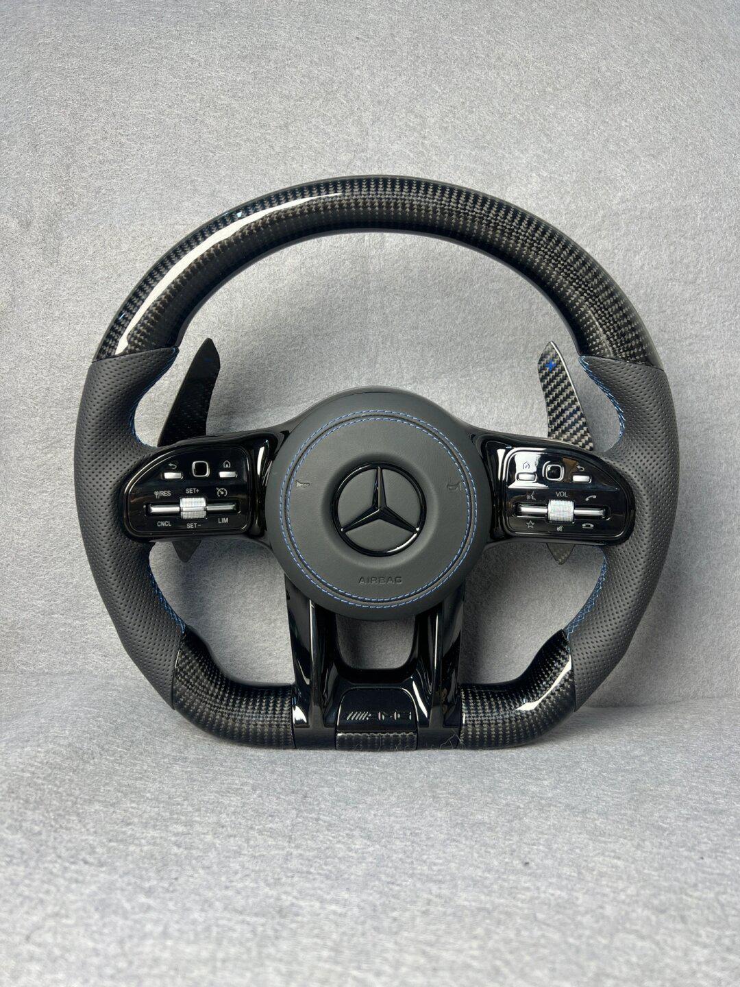 奔驰amg碳纤维方向盘总成,平底运动款打孔皮方向盘,多功能按键,碳纤维