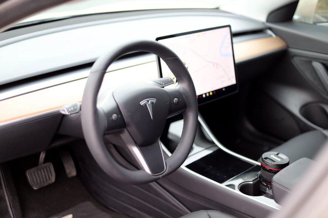 20年特斯拉model 3994.88开走