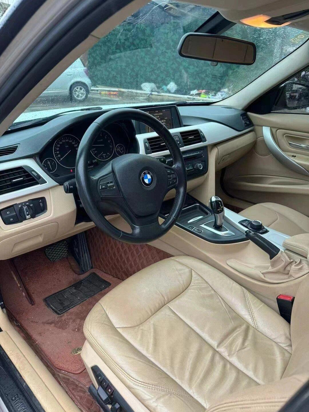 14年14款宝马320i 到手零投资 南宁最低价6.98万 可首付8000提车