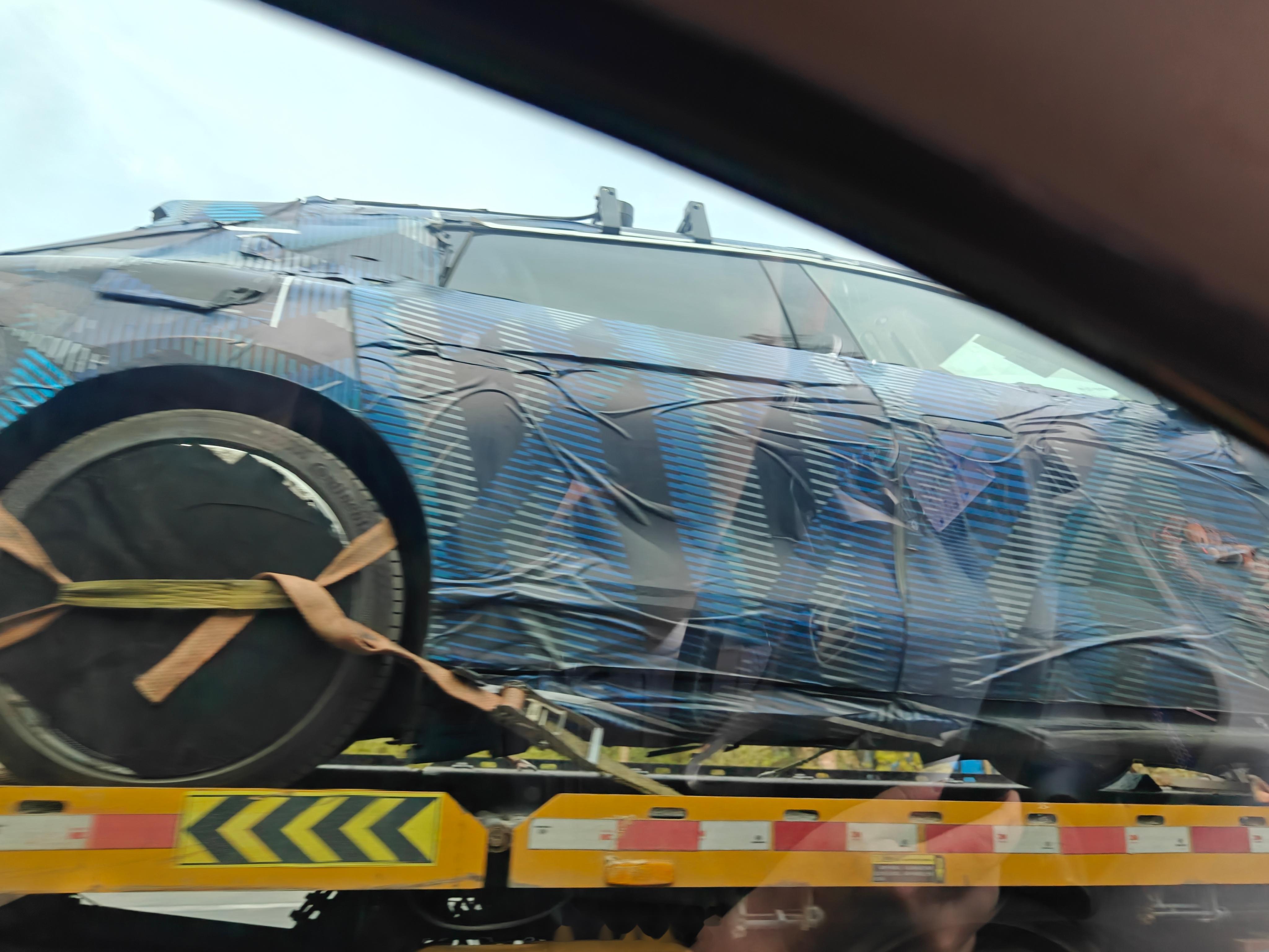 在深圳坪山遇到的伪装车,大家猜猜是什么 第一个猜对的送出安克30w