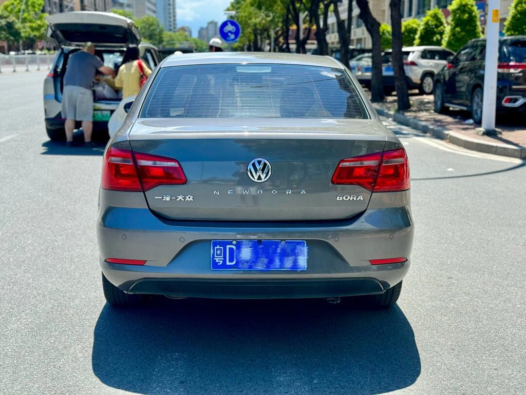 2014年大众宝来,14款1.6l自动舒适版,新车指导价:12.83万,表显4万