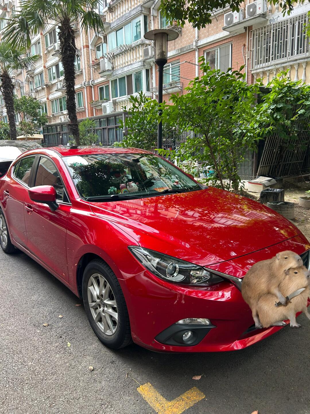 5的两厢昂克赛拉还值多少啊